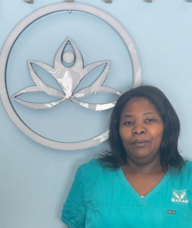 Book an Appointment with Ms. Joyce Wambui for Massage Therapy